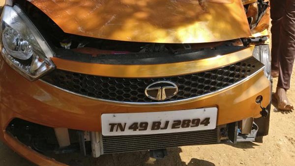 టియాగో కారు ఢీకొట్టడంతో రెండుగా చీలిపోయిన ట్రాక్టర్