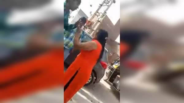ఆటో డ్రైవర్ను తుపాకీతో కాల్చిన మహిళ