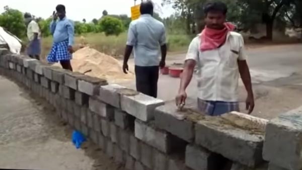 కరోనా ఎఫెక్ట్ : ఇతరులు తమ రాష్ట్రంలోకి రాకుండా రోడ్డుపైనే గోడ నిర్మాణం