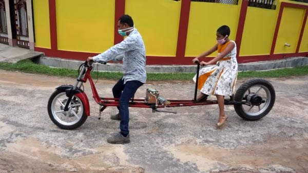 కూతురి కోసం సామజిక దూరంతో బైక్ తయారుచేసిన తండ్రి