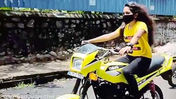 బైక్ డ్రైవ్స్ చేసిన యువతికి 20500 జరిమానా, ఎందుకో మీరే చూడండి