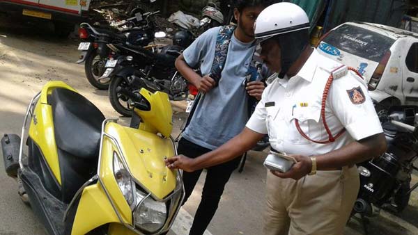 బైక్ డ్రైవ్స్ చేసిన యువతికి 20500 జరిమానా, ఎందుకో మీరే చూడండి