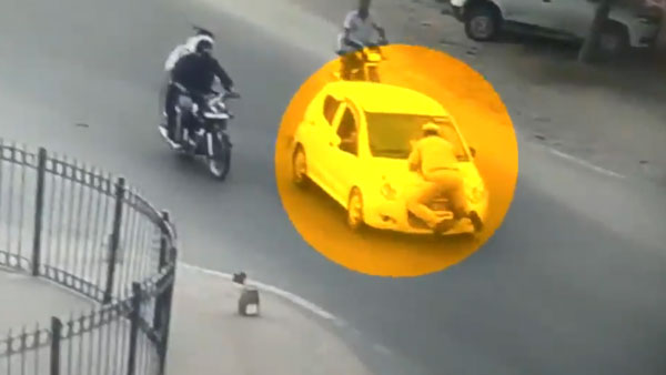 కార్ బోనెట్ మీద 200 మీటర్లు వేలాడుతూ వెళ్లిన హోమ్ గార్డ్ ; కారణం తెలిస్తే షాక్ అవుతారు