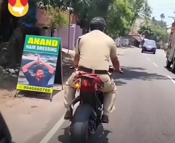 పోలీస్ స్టేషన్ ముందే బైక్ స్టంట్ చేసిన యువకుడు.. తర్వాత ఏమైందంటే?
