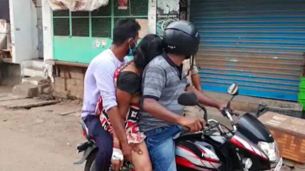 కరోనా కాటుకు బలైపోయిన మహిళను బైక్పై తరలించిన హృదయ విషాద గాథ.. ఎక్కడంటే?